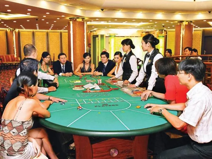 Illustration introducing Sicbo Casino in Vietnam, showcasing Sicbo dice games in action, the elegant interior of the casino, and elements that highlight the integration of traditional Vietnamese aesthetics with modern gaming experiences.