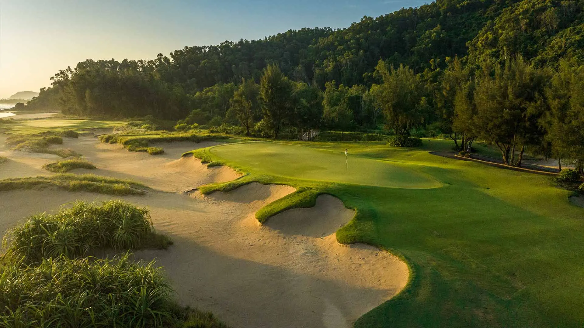 Image showcasing various Vietnam golf resort packages, featuring a selection of premium golf resorts with stunning courses, elegant facilities, beautiful natural surroundings, and tailored options for golf enthusiasts seeking an exceptional vacation.