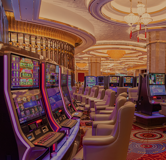 Elegant casino floor with tables and slot machines