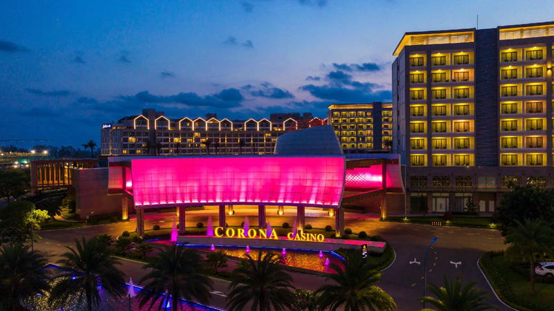 Aerial view of Corona Resort & Casino surrounded by tropical beaches