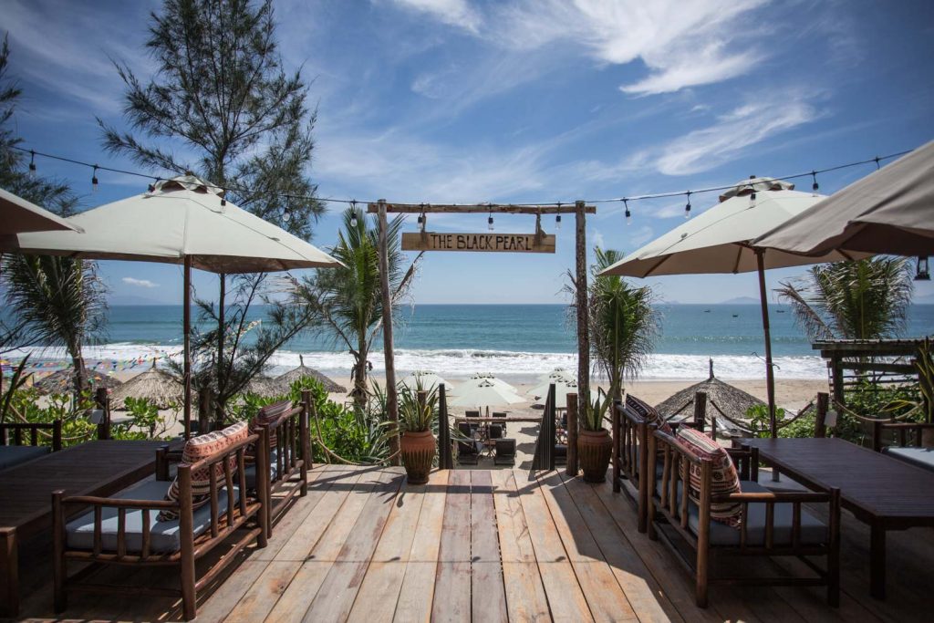 Aerial view of The Edge in Hoi An, a luxurious beach club with an infinity pool overlooking the coastline