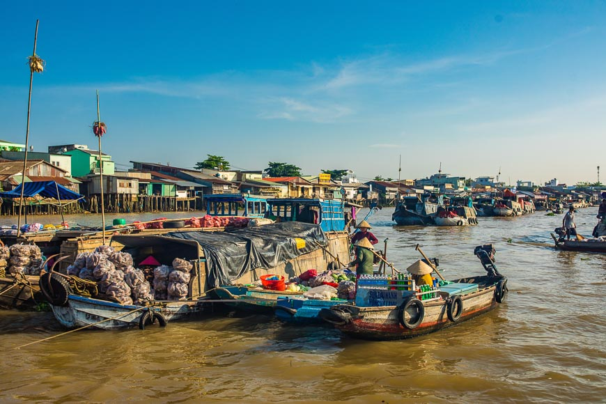 Explore the bustling waterways of the Mekong Delta, where floating markets, lush greenery, and traditional villages offer a glimpse into Vietnam's rich cultural heritage.