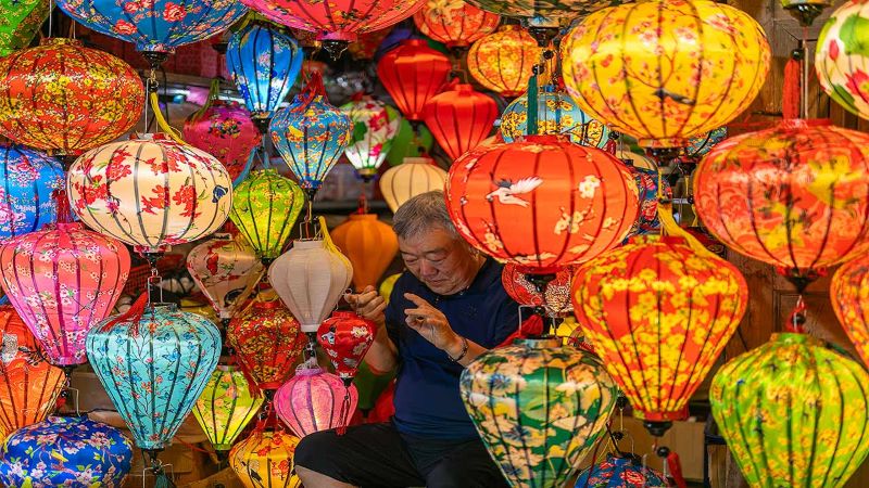 Wander through the enchanting lantern market in Hội An, where vibrant colors light up the night.