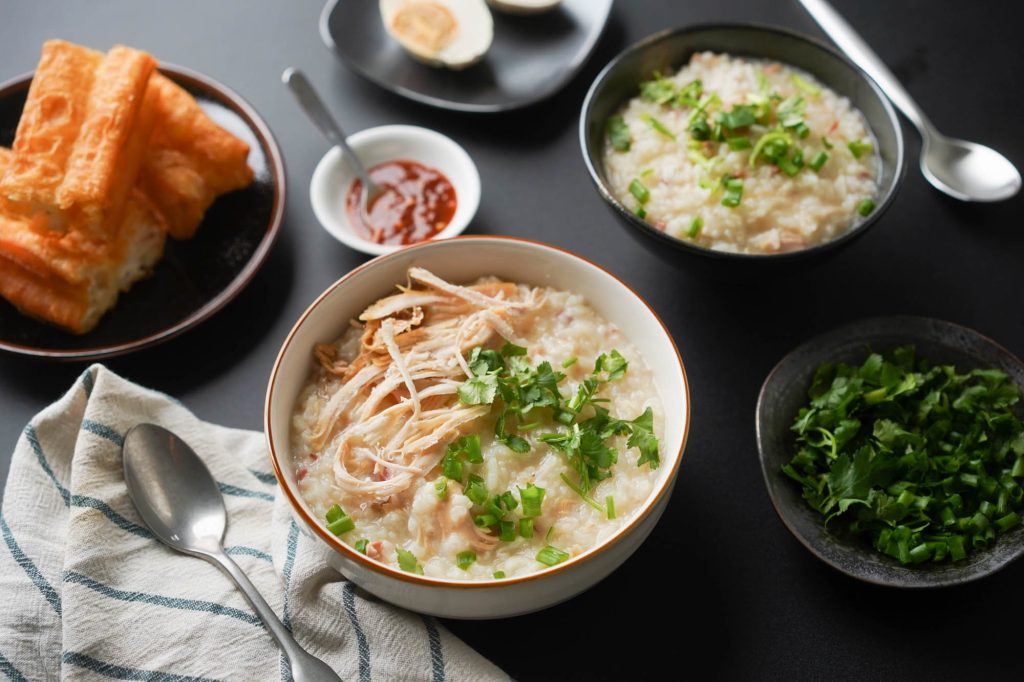 Warm up with a comforting bowl of Vietnamese rice porridge (Cháo), a delicious and soothing dish perfect for any meal.