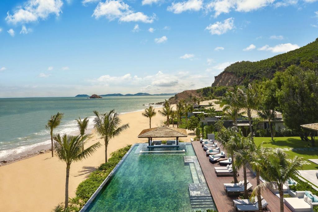 illas at Anantara Quy Nhon with a view of the crystal-clear sea and white sandy beaches.