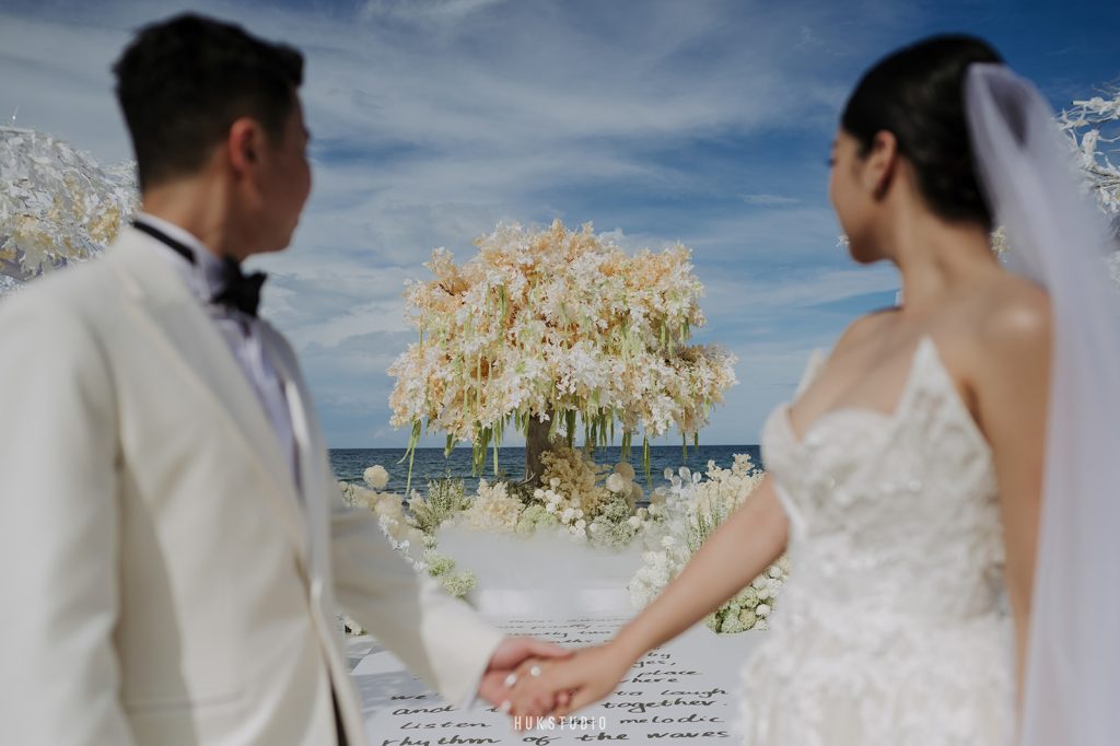 Lisa and Nguyen celebrating their wedding at Hoiana New World Beach Resort with family and friends.