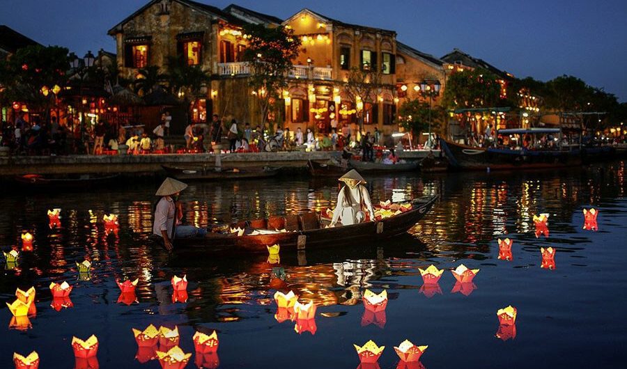 Hoi An Ancient Town decorated with lanterns and hosting traditional festivals on Independence Day.