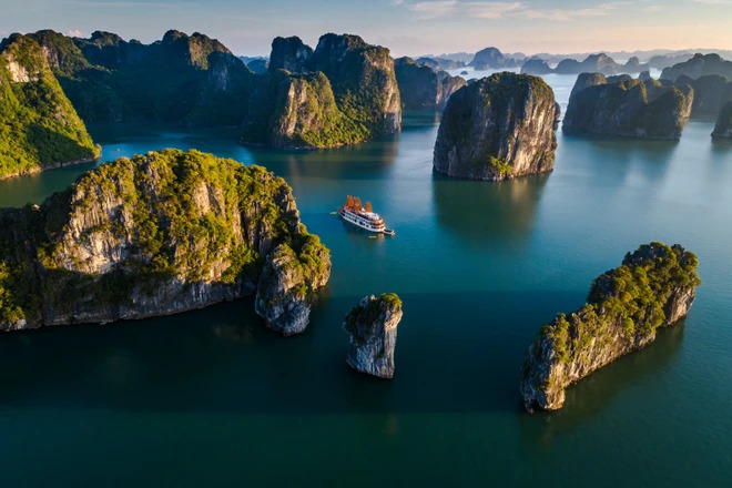 A cruise in Ha Long Bay amidst stunning natural landscapes and festival activities during Independence Day.