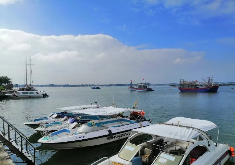 Scenic view of Cham Island, Hoi An, featuring lush greenery, crystal-clear waters, and a tranquil atmosphere perfect for relaxation and exploration.