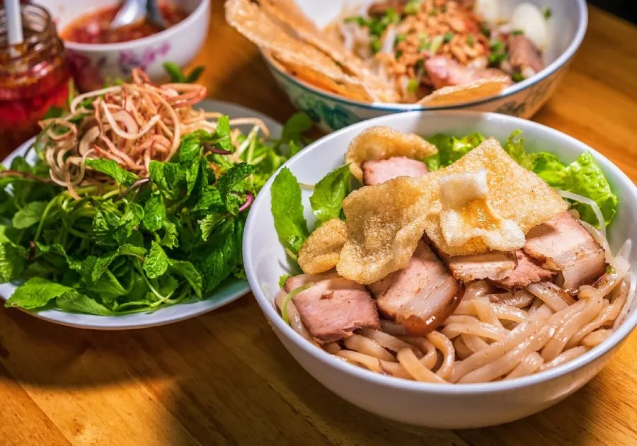 Cooking class in Hoi An: Learn to prepare traditional Vietnamese dishes with expert chefs in a hands-on, immersive experience.