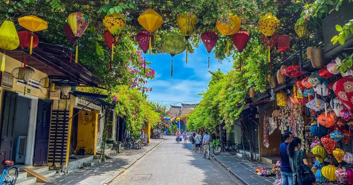 Journey from Hue to Hoi An, showcasing vibrant countryside views, traditional villages, and the coastal charm of Vietnam.