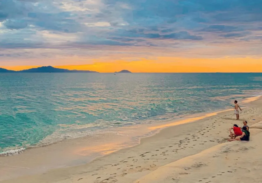 Discover the stunning beauty of Cua Dai Beach with its soft white sands, clear blue waters, and relaxing atmosphere, perfect for your next tropical getaway.