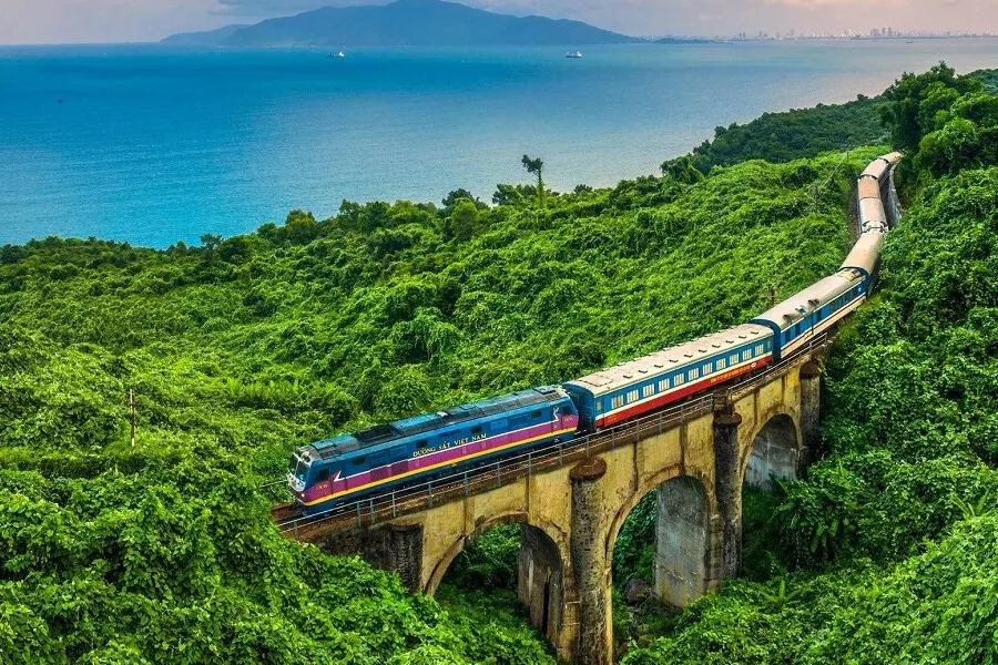 Scenic travel routes and transportation options for the journey from Hanoi to Hoi An, showcasing Vietnam's breathtaking landscapes and cultural highlights.