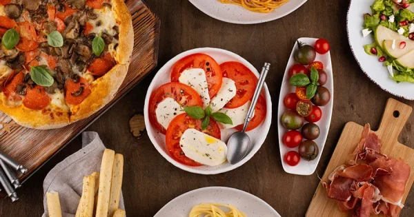 "Cozy Italian restaurant in Hoi An featuring wood-fired pizzas, fresh pasta, and a warm, rustic interior inspired by traditional Italian trattorias."