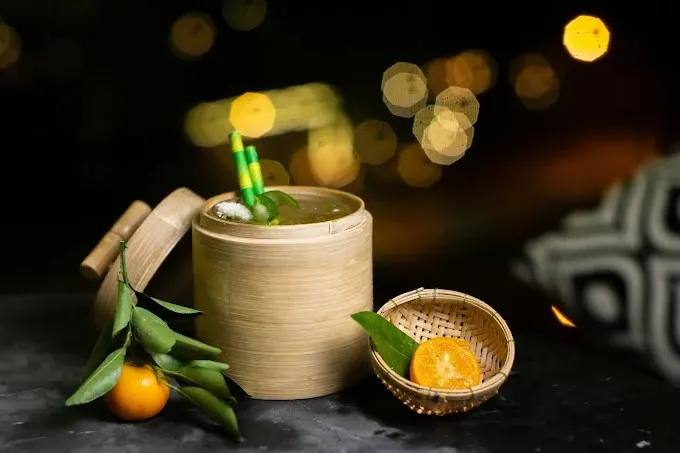 "Stylish cocktail bar in Hoi An with handcrafted drinks, cozy lighting, and a mix of traditional and contemporary decor creating a relaxed evening atmosphere."