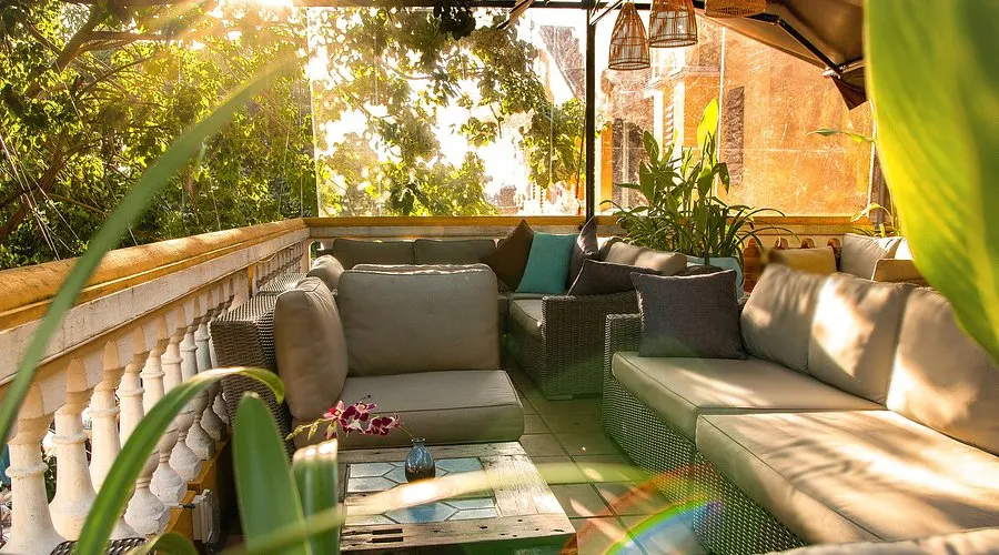 "Stylish cocktail bar in Hoi An with handcrafted drinks, cozy lighting, and a mix of traditional and contemporary decor creating a relaxed evening atmosphere."