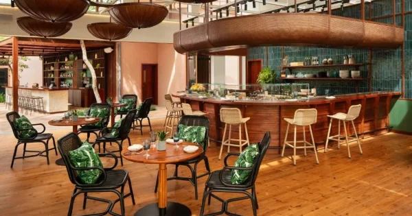"Stylish cocktail bar in Hoi An with handcrafted drinks, cozy lighting, and a mix of traditional and contemporary decor creating a relaxed evening atmosphere."