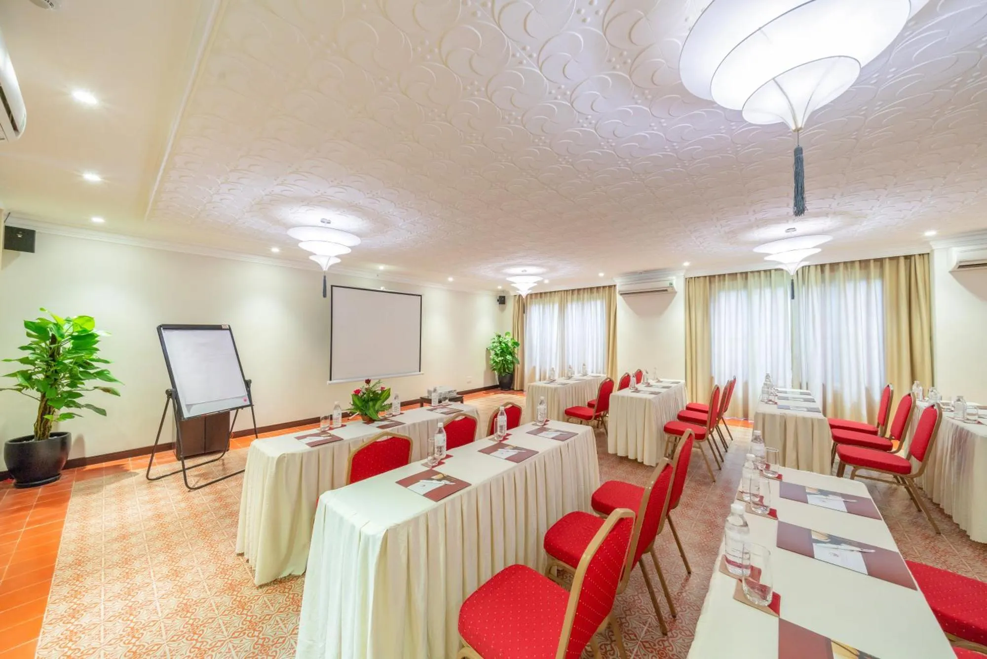"Elegant setup at one of the top networking event venues in Hoi An, featuring open-air seating, ambient lighting, and a blend of modern and heritage architecture."