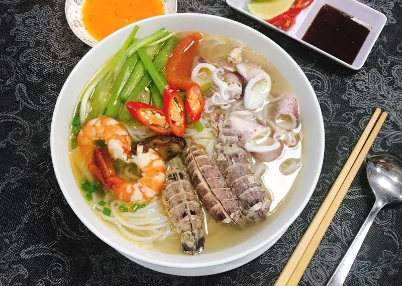 "Authentic Asian restaurant in Hoi An serving a variety of regional dishes in a beautifully decorated space blending modern comfort with traditional charm."