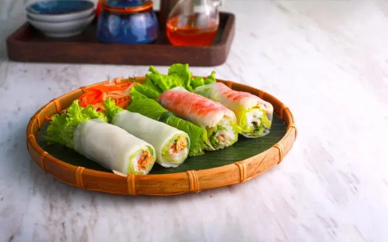 "Authentic Asian restaurant in Hoi An serving a variety of regional dishes in a beautifully decorated space blending modern comfort with traditional charm."