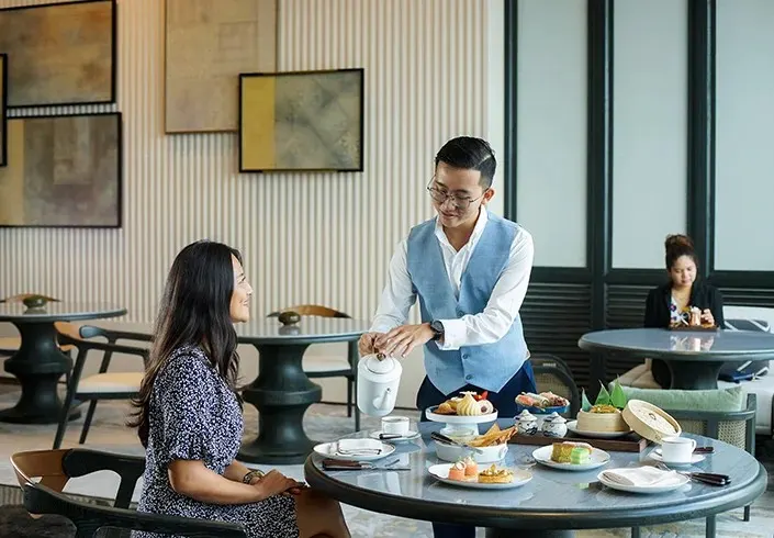 "Authentic Asian restaurant in Hoi An serving a variety of regional dishes in a beautifully decorated space blending modern comfort with traditional charm."