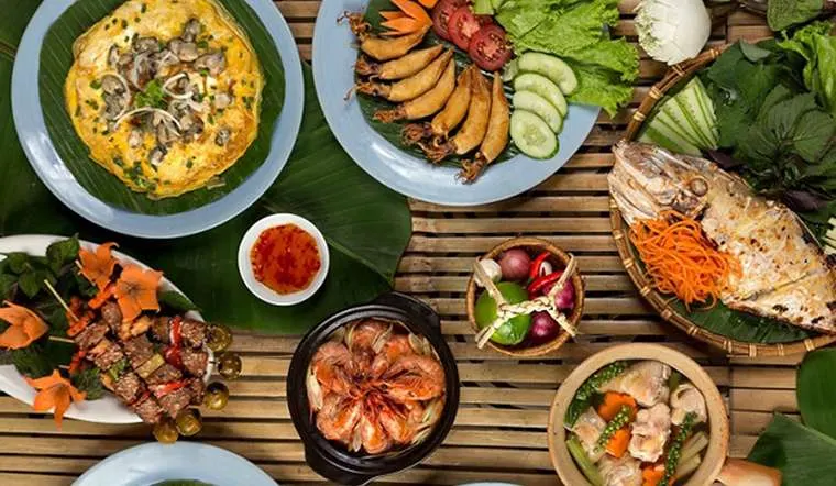 "Authentic Asian restaurant in Hoi An serving a variety of regional dishes in a beautifully decorated space blending modern comfort with traditional charm."