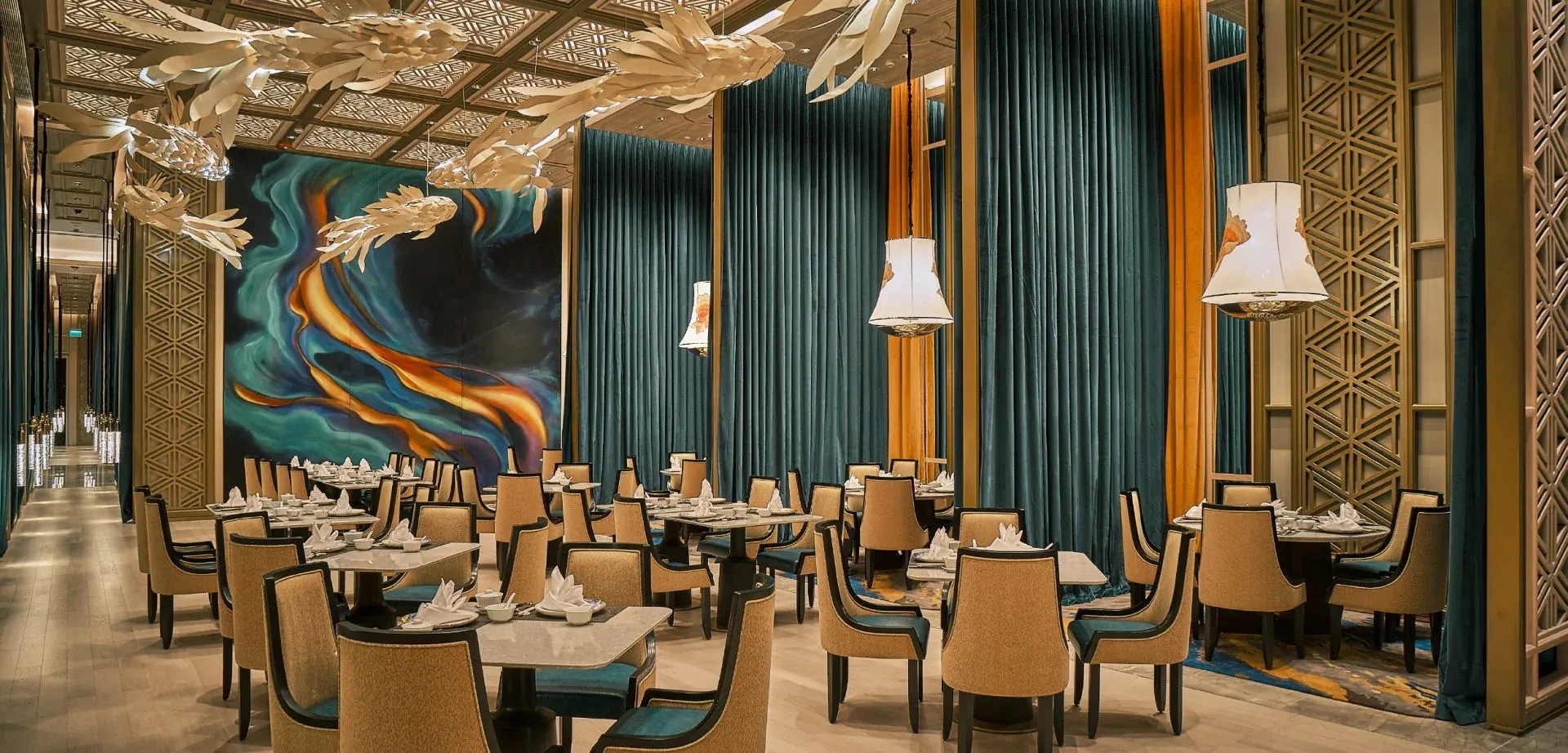 "Traditional Chinese restaurant in Hoi An with classic red lantern decor, round dining tables, and a menu featuring dim sum, Peking duck, and regional specialties."