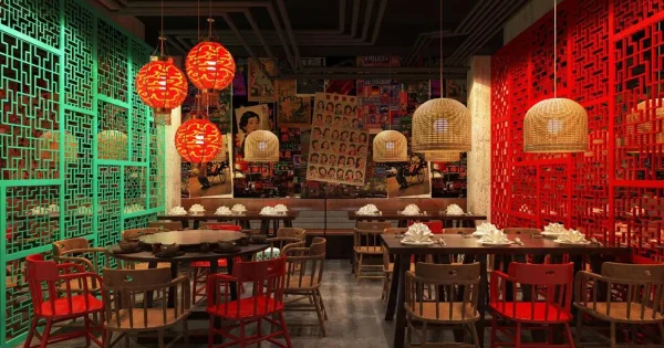 "Traditional Chinese restaurant in Hoi An with classic red lantern decor, round dining tables, and a menu featuring dim sum, Peking duck, and regional specialties."